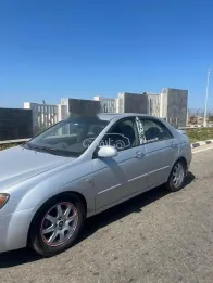 كيا سيراتو 2004 فضي مستعملة للبيع