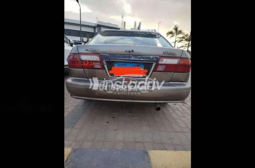 نيسان صنى 2000 بني مستعملة للبيع - 1