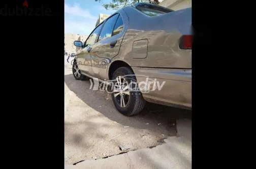 نيسان صنى 2000 بني مستعملة للبيع - 4