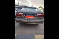 نيسان صنى 2000 بني مستعملة للبيع