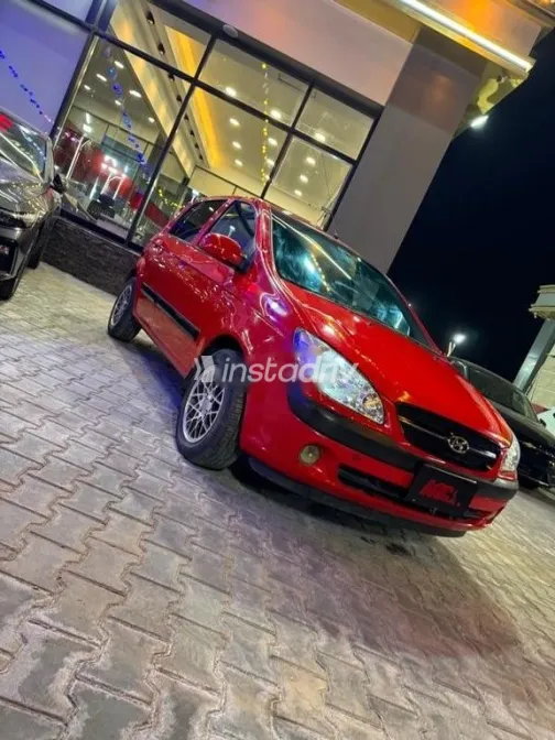 هيونداي جيتز 2010 أحمر مستعملة للبيع - 3