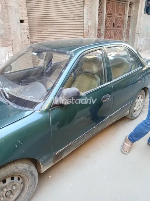 هيونداي اكسنت 1999 أخضر غامق مستعملة للبيع - 1