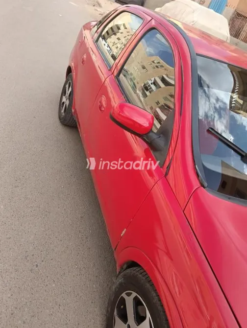 اوبل كورسا 2003 أحمر مستعملة للبيع - 4