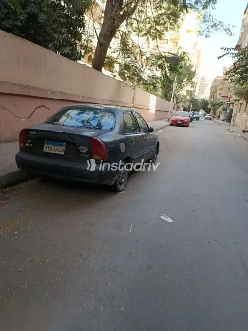 دايو لانوس 2002 رمادي مستعملة للبيع - 1