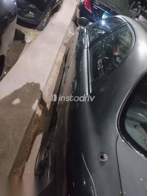 دايو لانوس 2002 رمادي مستعملة للبيع - 4