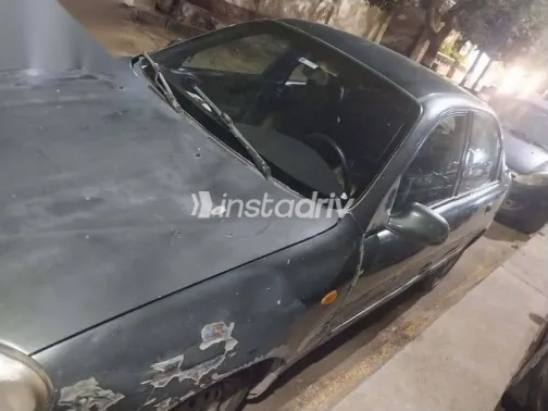 دايو لانوس 2002 رمادي مستعملة للبيع - 6