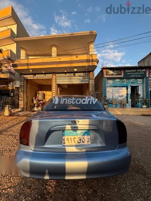 دايو لانوس 2005 أزرق غامق مستعملة للبيع - 5