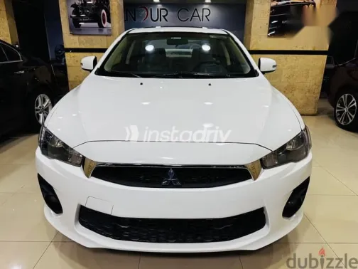 ميتسوبيشي لانسر 2017 أبيض مستعملة للبيع - 1