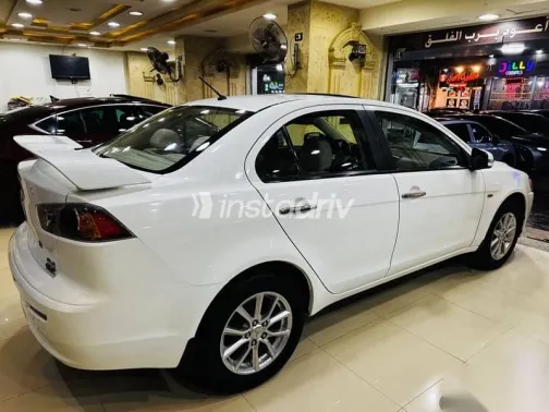 ميتسوبيشي لانسر 2017 أبيض مستعملة للبيع - 6