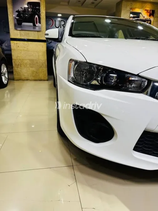 ميتسوبيشي لانسر 2017 أبيض مستعملة للبيع - 9