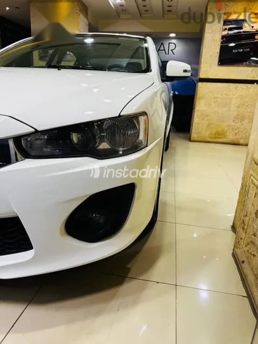 ميتسوبيشي لانسر 2017 أبيض مستعملة للبيع - 10