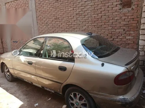 دايو لانوس 1999 ذهبي مستعملة للبيع - 2