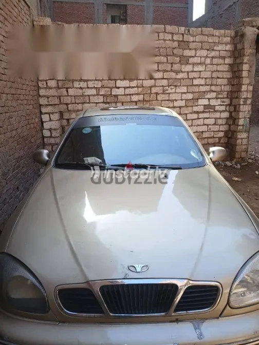 دايو لانوس 1999 ذهبي مستعملة للبيع - 3