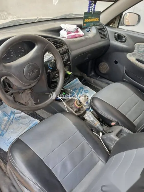 دايو لانوس 1999 ذهبي مستعملة للبيع - 4