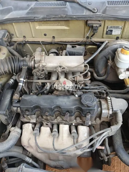 دايو لانوس 1999 ذهبي مستعملة للبيع - 6