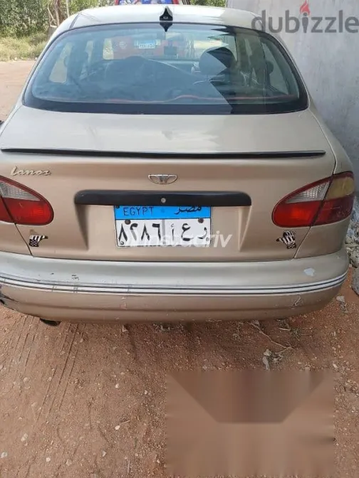 دايو لانوس 1999 ذهبي مستعملة للبيع - 9