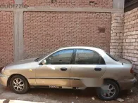 دايو لانوس 1999 ذهبي مستعملة للبيع