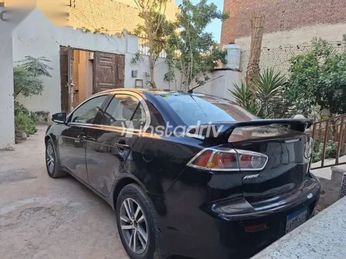 ميتسوبيشي لانسر 2015 أسود مستعملة للبيع - 7