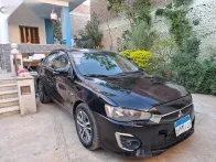ميتسوبيشي لانسر 2015 أسود مستعملة للبيع