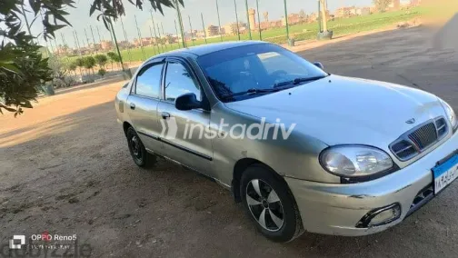 دايو لانوس 1999 فضي مستعملة للبيع - 1