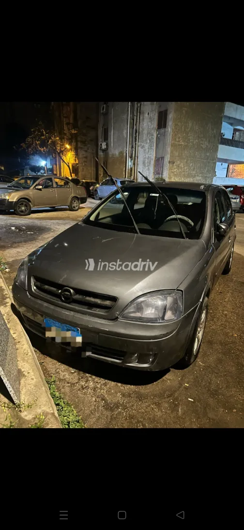 اوبل كورسا 2004 أبيض مستعملة للبيع - 3