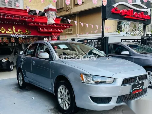 ميتسوبيشي لانسر 2015 فضي مستعملة للبيع - 3