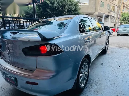 ميتسوبيشي لانسر 2015 فضي مستعملة للبيع - 4