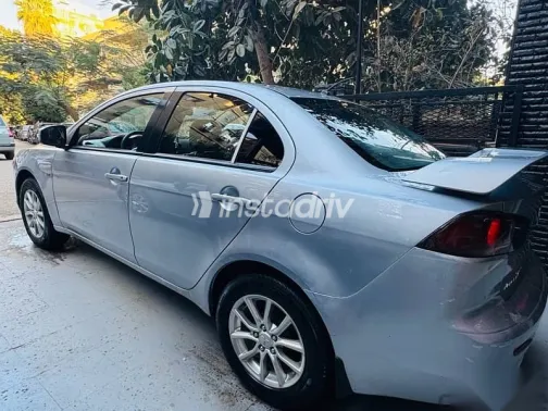 ميتسوبيشي لانسر 2015 فضي مستعملة للبيع - 6