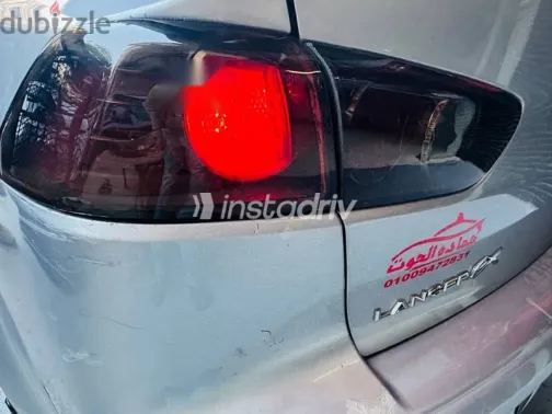 ميتسوبيشي لانسر 2015 فضي مستعملة للبيع - 8