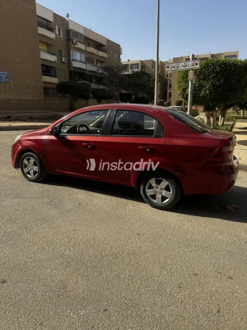 شيفروليه افيو 2015 أحمر غامق مستعملة للبيع - 3