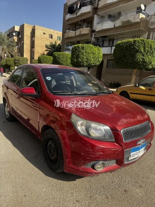 شيفروليه افيو 2015 أحمر غامق مستعملة للبيع - 4