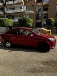 شيفروليه افيو 2015 أحمر غامق مستعملة للبيع