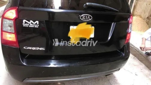كيا كارينز 2011 أسود مستعملة للبيع - 2