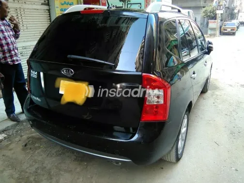 كيا كارينز 2011 أسود مستعملة للبيع - 3