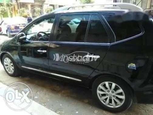 كيا كارينز 2011 أسود مستعملة للبيع - 4