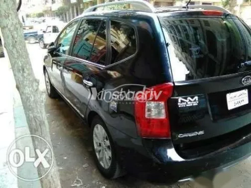 كيا كارينز 2011 أسود مستعملة للبيع - 5