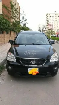 كيا كارينز 2011 أسود مستعملة للبيع