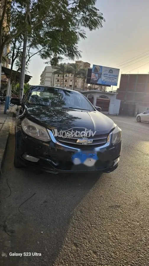 شيفروليه أوبترا 2015 أسود مستعملة للبيع - 5