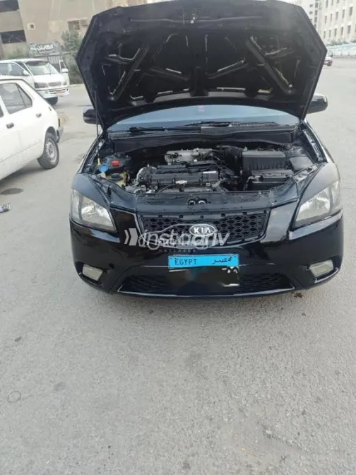 كيا ريو 2011 أسود مستعملة للبيع - 2