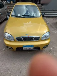 دايو لانوس 2000 ذهبي مستعملة للبيع