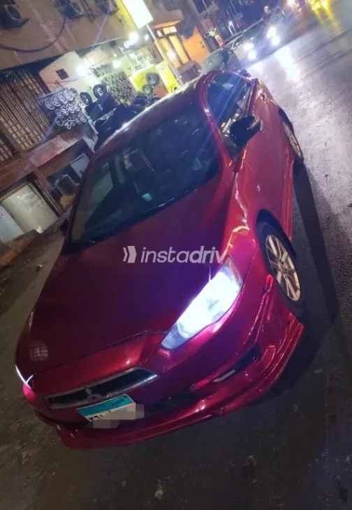 ميتسوبيشي لانسر 2016 أبيض مستعملة للبيع - 1