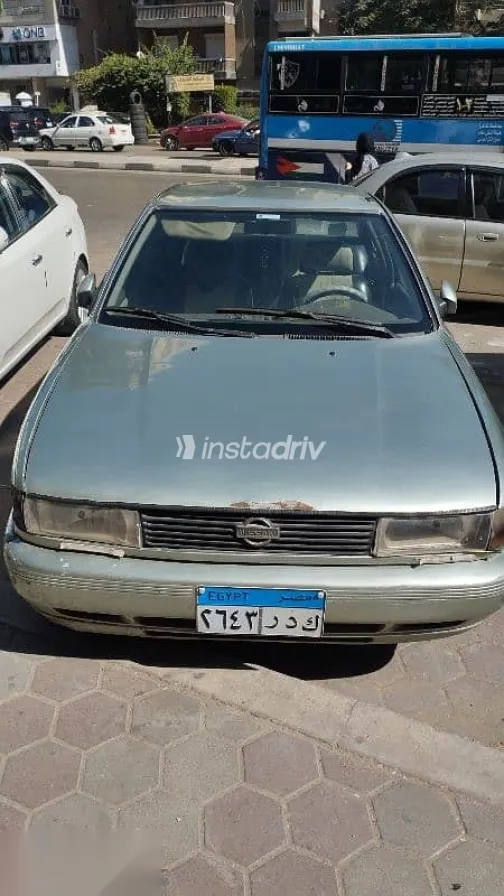 نيسان صنى 1994 فضي مستعملة للبيع - 3