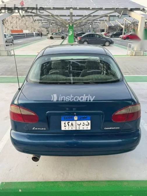 دايو لانوس 1999 أزرق غامق مستعملة للبيع - 1