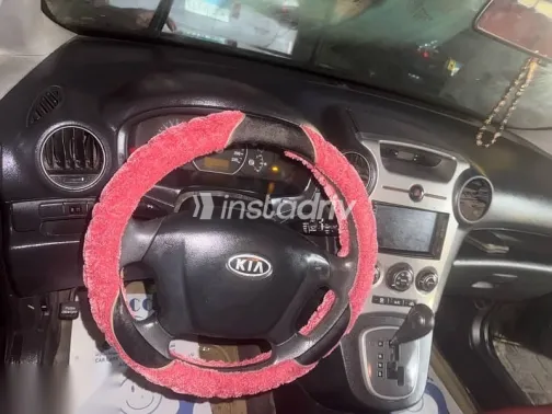 كيا كارينز 2010 أسود مستعملة للبيع - 5