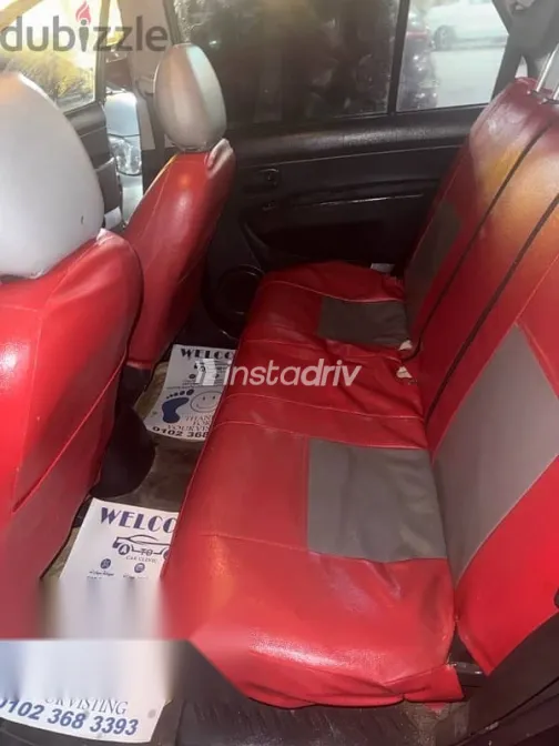 كيا كارينز 2010 أسود مستعملة للبيع - 7