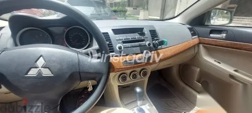 ميتسوبيشي لانسر 2011 أبيض مستعملة للبيع - 2