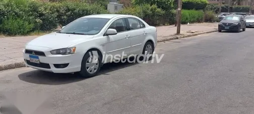 ميتسوبيشي لانسر 2011 أبيض مستعملة للبيع - 4
