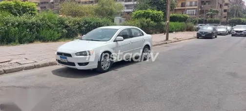 ميتسوبيشي لانسر 2011 أبيض مستعملة للبيع - 5