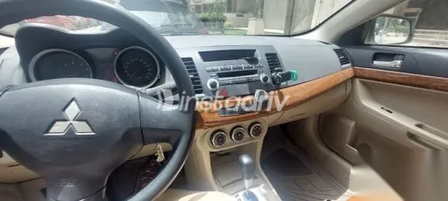 ميتسوبيشي لانسر 2011 أبيض مستعملة للبيع - 6