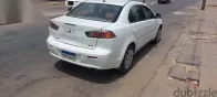 ميتسوبيشي لانسر 2011 أبيض مستعملة للبيع